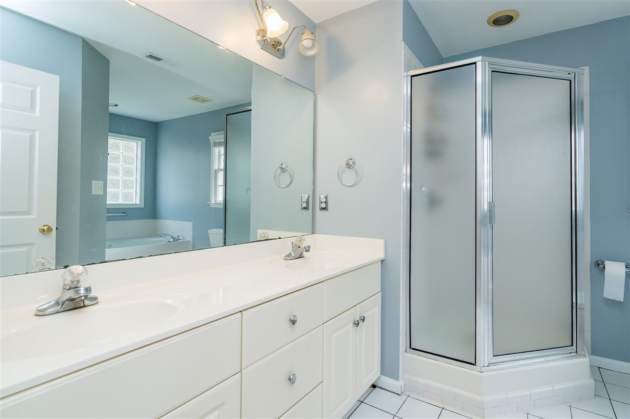 501 Woodland Road Raleigh, NC 27603 - Photo 20 of 28 Owner's Suite Bathroom with separate jetted tub OWNER'S BATH