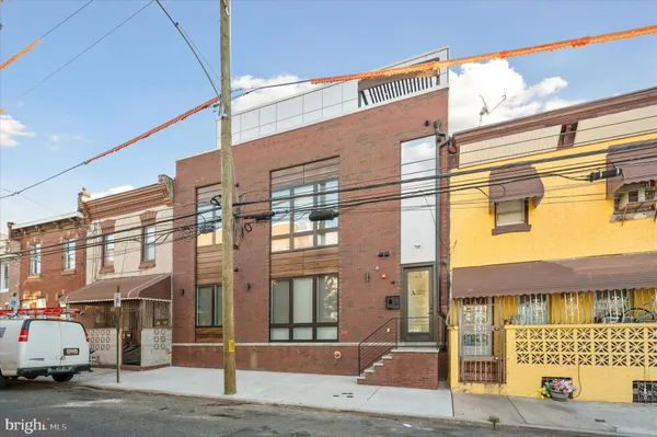 a front view of a building with street