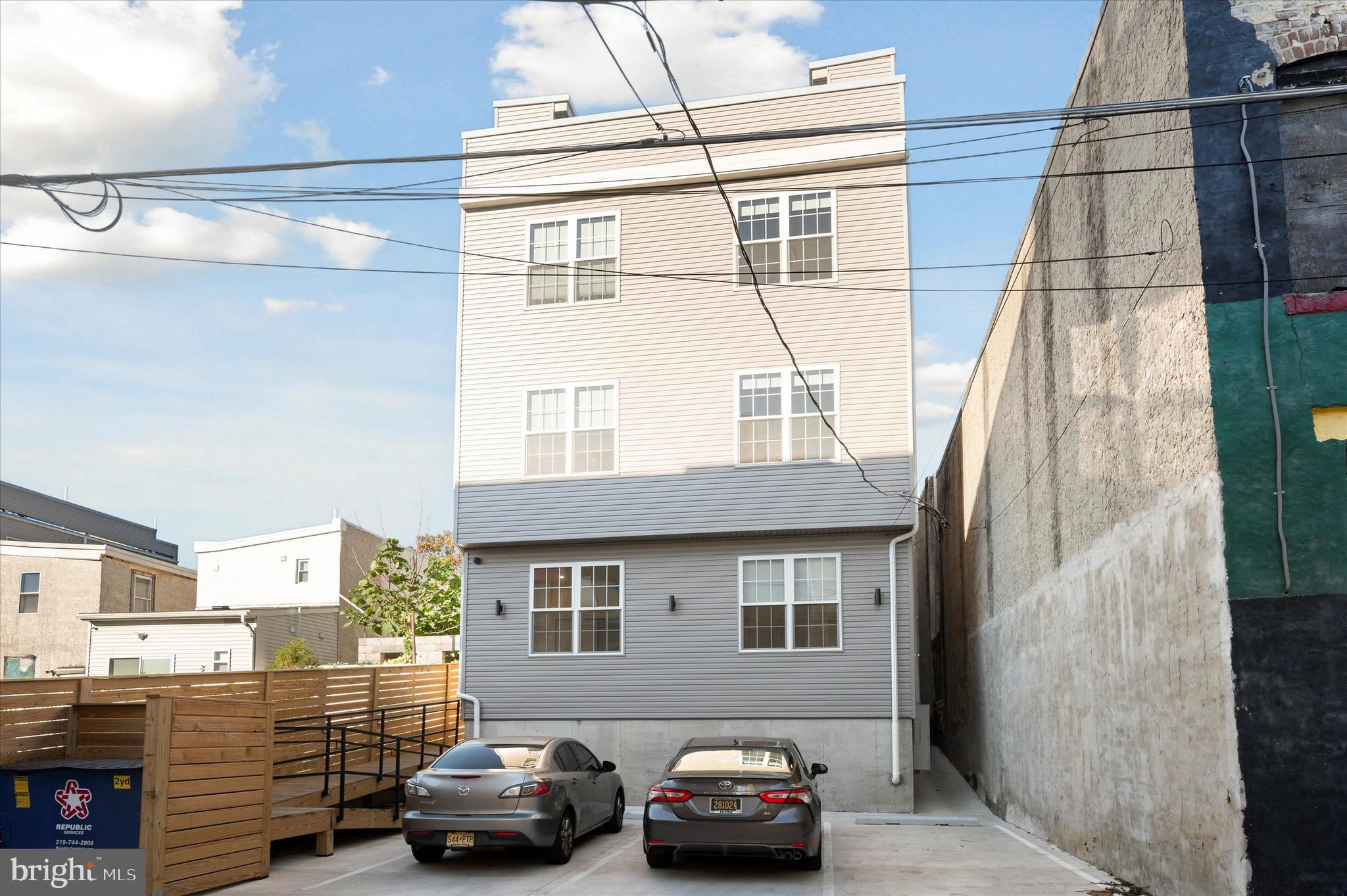 2513 North Howard Street, Unit 303 Philadelphia, PA 19133 - Photo 23 of 24 a car parked in front of a building
