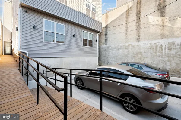 a car parked in front of a house
