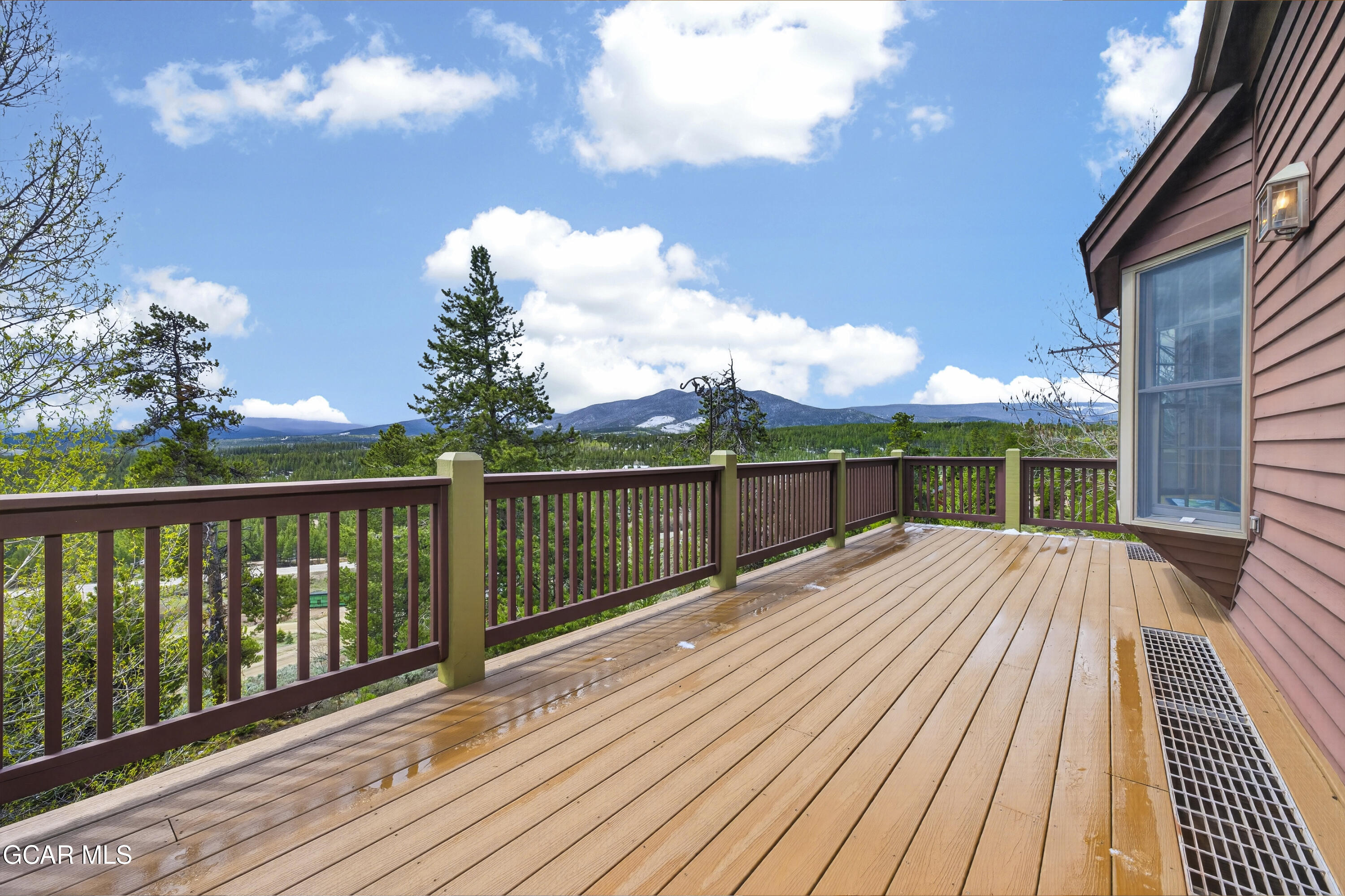 400 Ridge Road Tabernash, CO 80478 - Photo 22 of 50 a balcony with wooden floor and fence