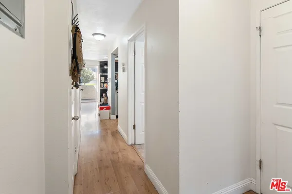 a view of a livingroom from a hallway