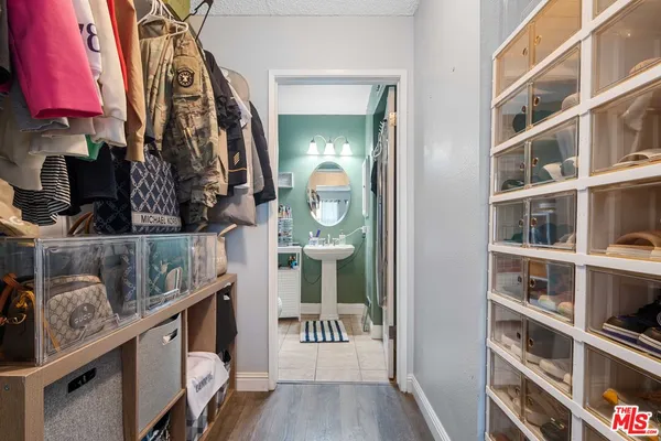 a view of a hallway with closet