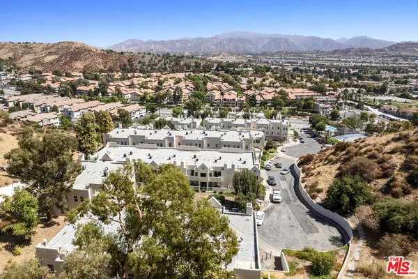 an aerial view of residential house and outdoor space