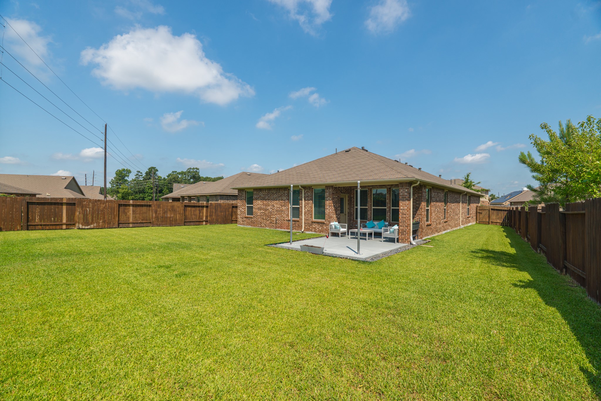 24322 North Newcastle Bay Trail Spring, TX 77389 - Photo 44 of 50 a view of a house with backyard and sitting area