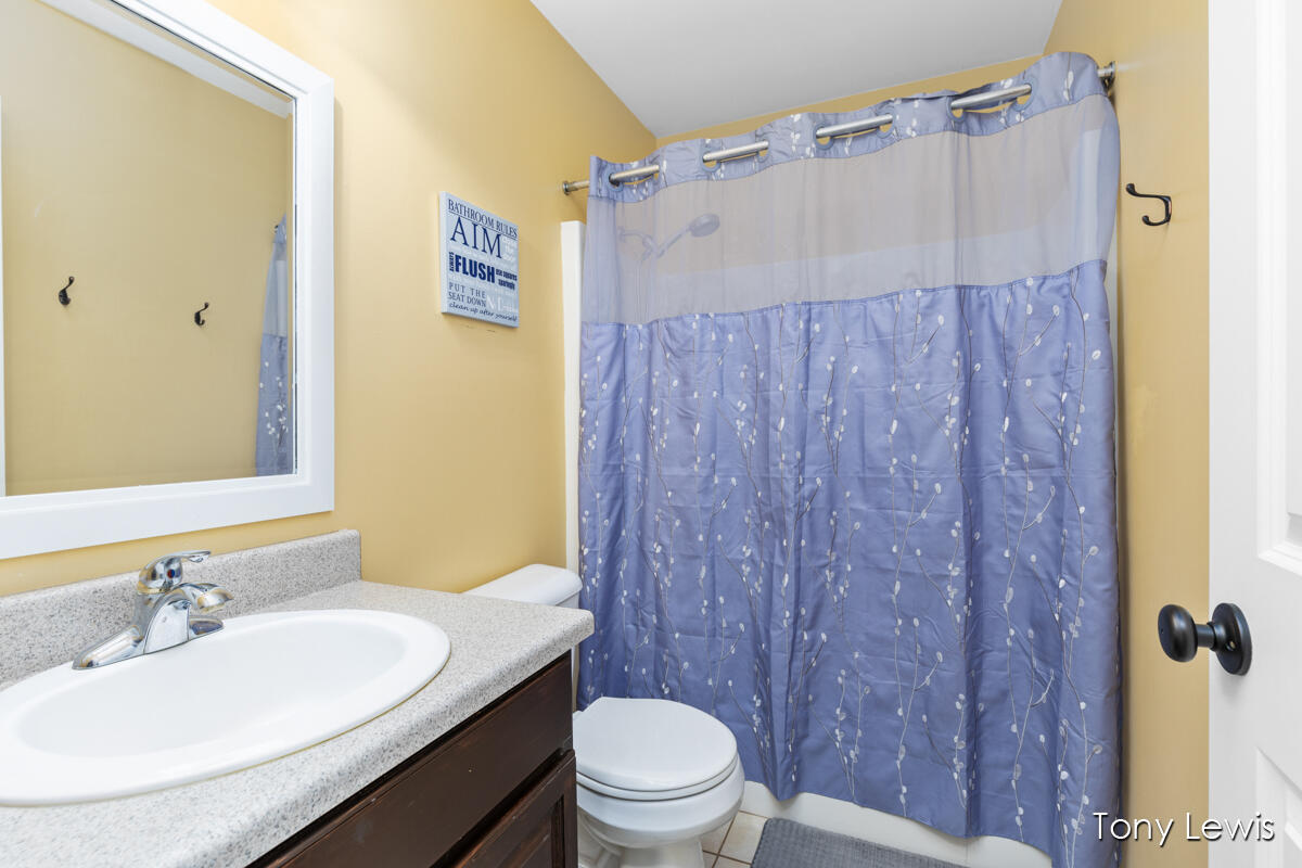 6583 Ravineview Southeast Caledonia, MI 49316 - Photo 20 of 39 2nd full bathroom main level