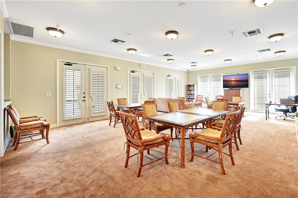 410 Bayfront Place, Unit 2409 Naples, FL 34102 - Photo 22 of 23 a dining room with furniture and window