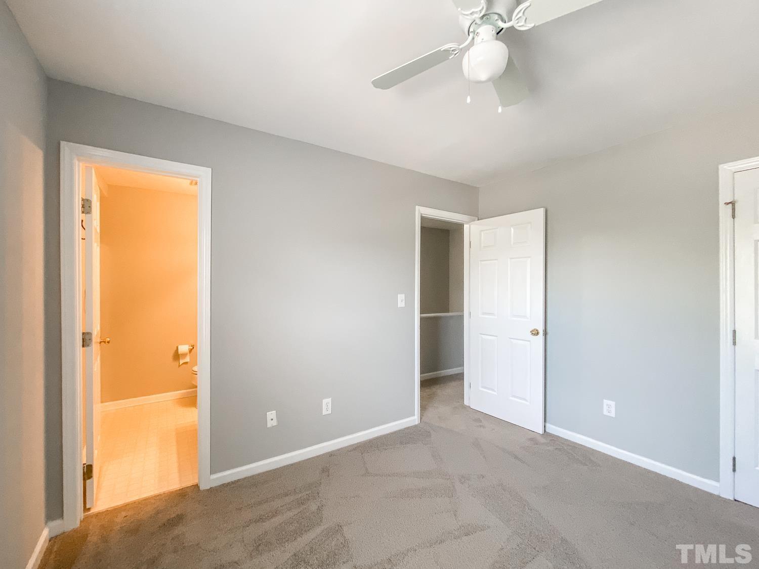 5242 Eagle Trace Drive Raleigh, NC 27604 - Photo 12 of 24 a view of an empty room and a window