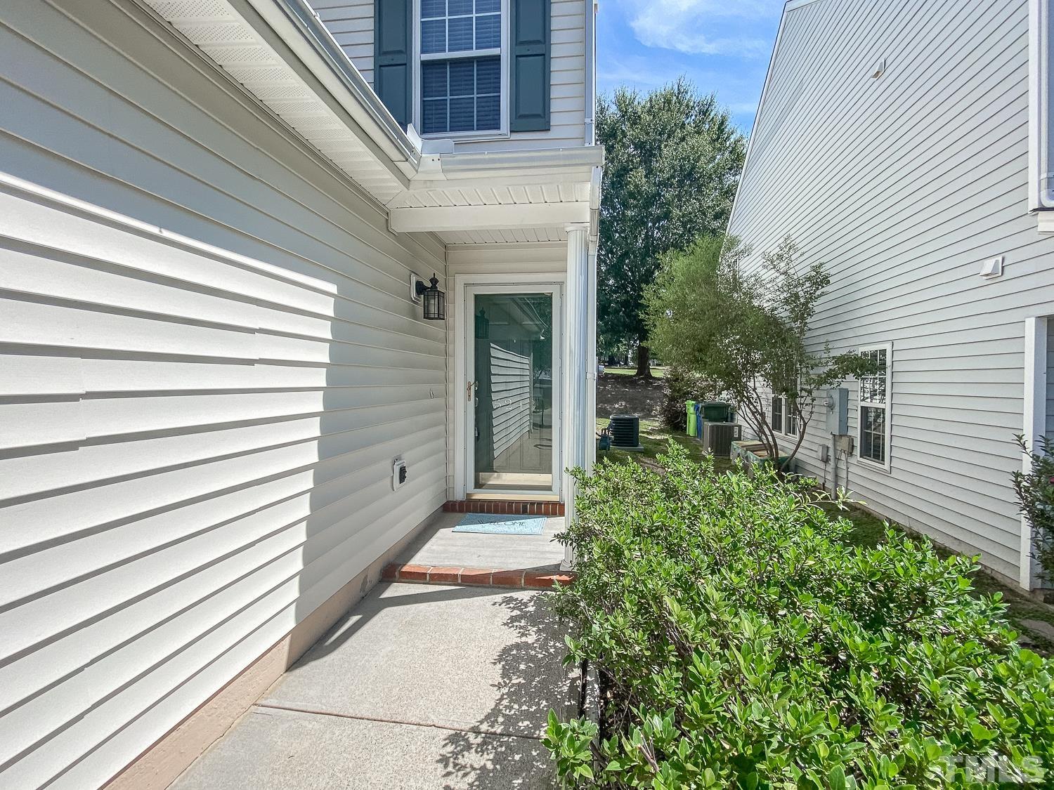 5242 Eagle Trace Drive Raleigh, NC 27604 - Photo 2 of 24 a view of a porch with a bench