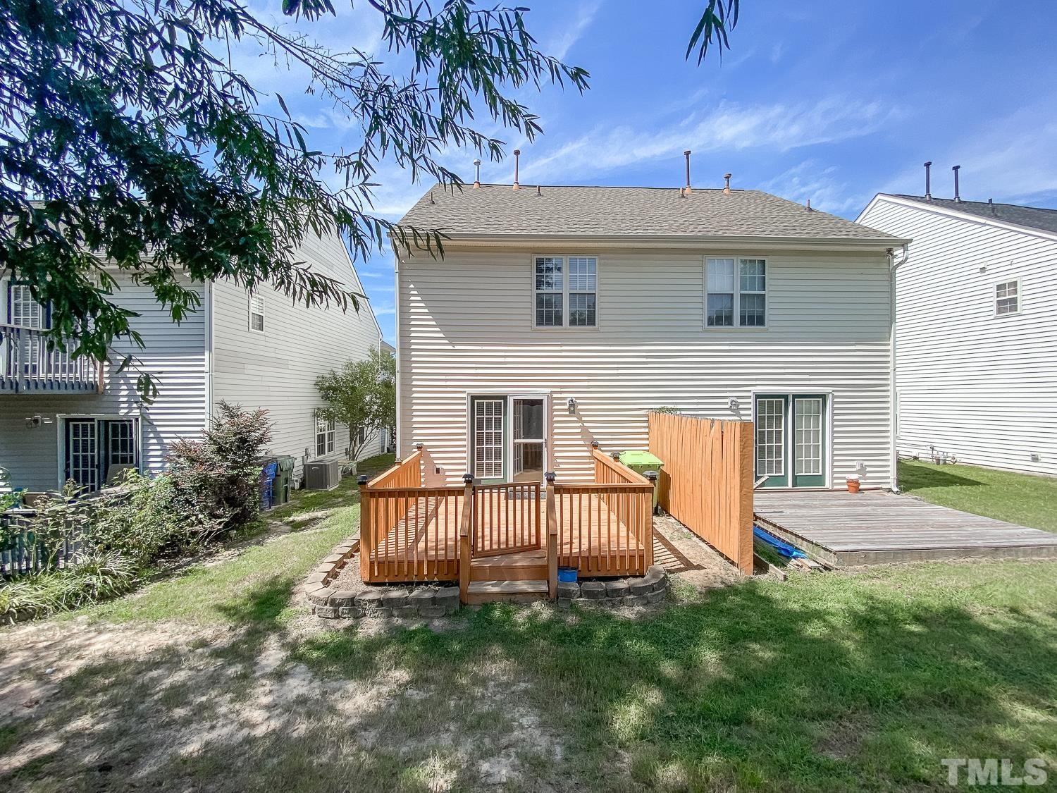 5242 Eagle Trace Drive Raleigh, NC 27604 - Photo 21 of 24 a view of a house with a yard