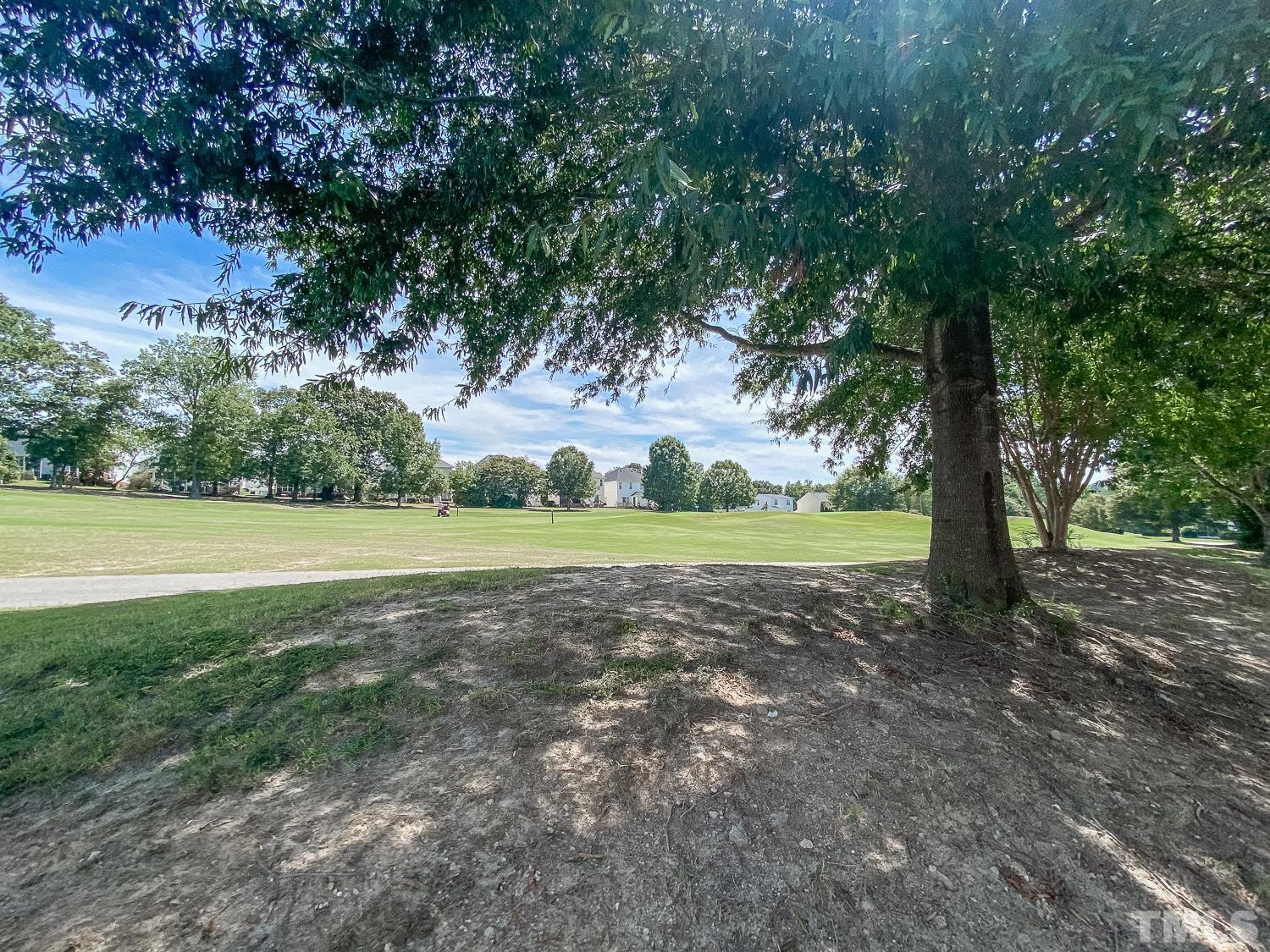 5242 Eagle Trace Drive Raleigh, NC 27604 - Photo 24 of 24 a view of outdoor space with trees all around