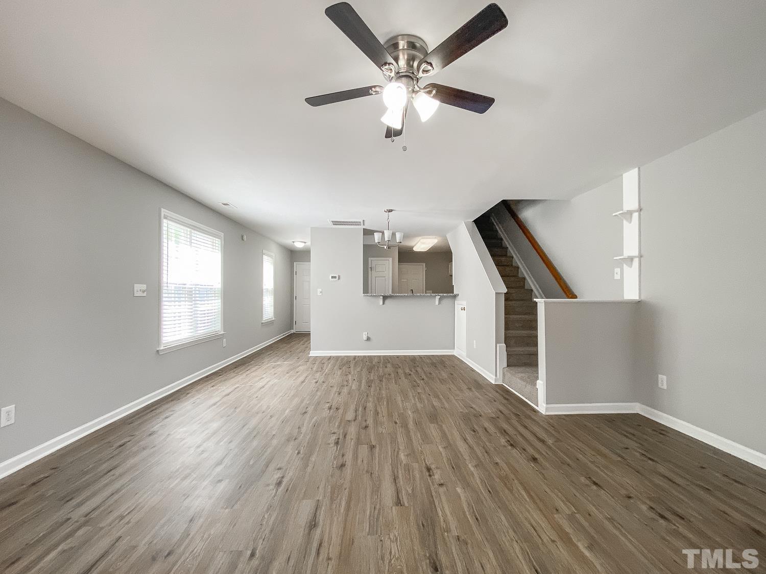 5242 Eagle Trace Drive Raleigh, NC 27604 - Photo 9 of 24 wooden floor in an empty room with a window