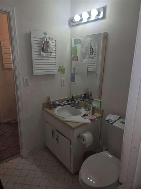 3647 Cobble Mill Lane Clarkston, GA 30021 - Photo 17 of 19 a bathroom with a granite countertop double vanity sink and a mirror