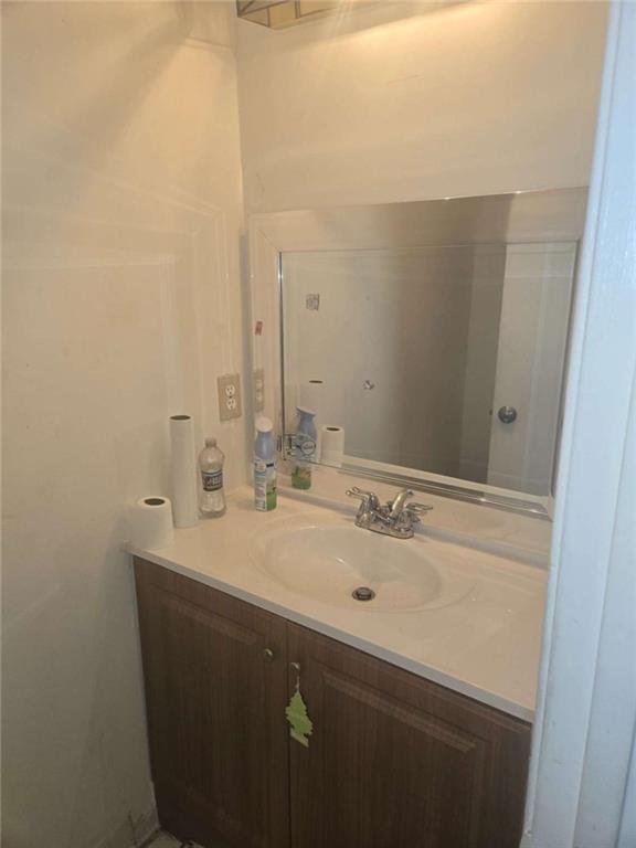 3647 Cobble Mill Lane Clarkston, GA 30021 - Photo 8 of 19 a bathroom with a sink and a mirror