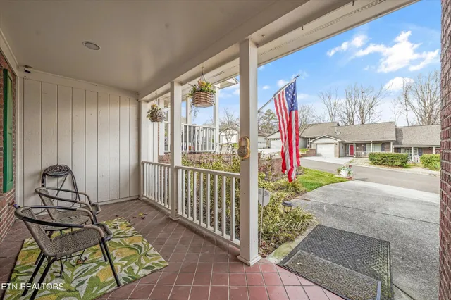 a view of hallway with wooden floor