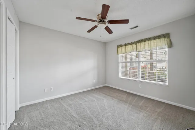a kitchen that has a sink and a stove in it