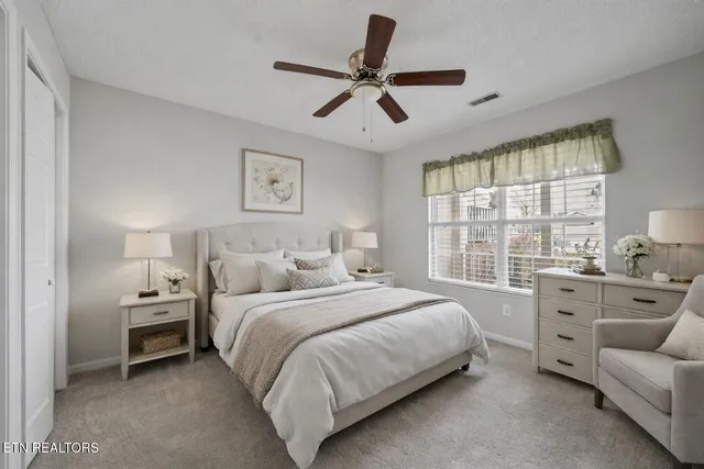 a kitchen with stainless steel appliances a sink and a refrigerator
