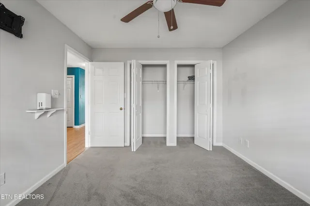 a kitchen with stainless steel appliances a sink and a refrigerator