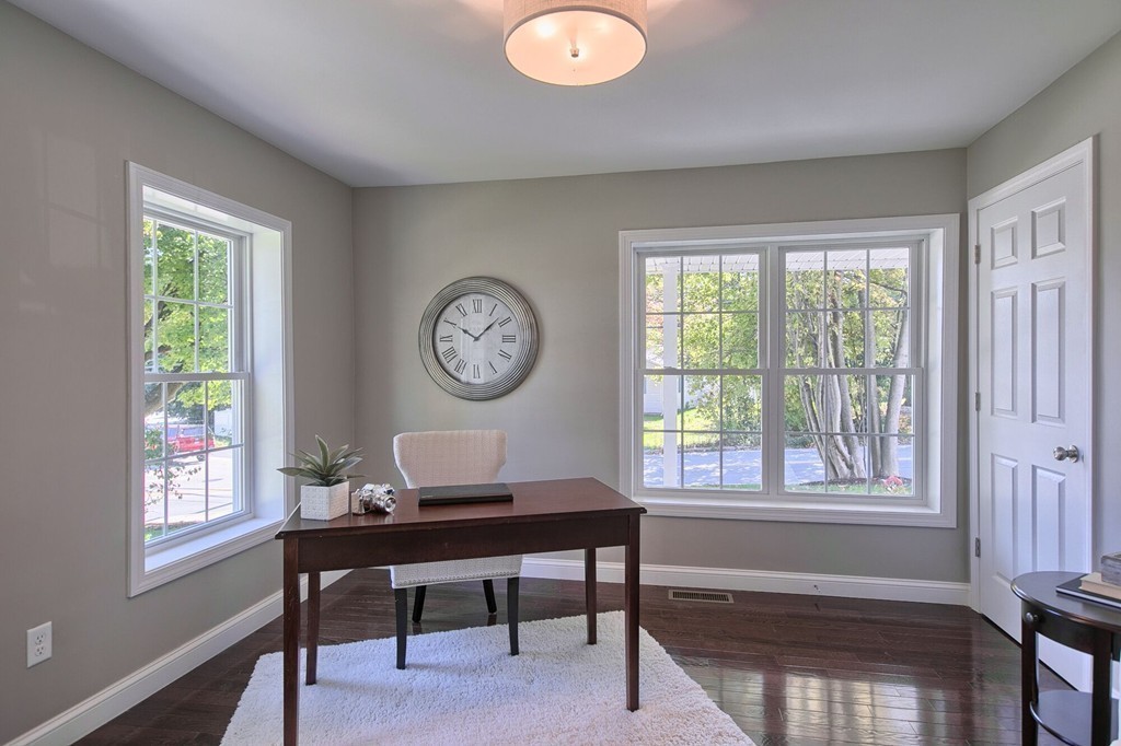 5 Davis Road Chelmsford, MA 01824 - Photo 12 of 27 a living room with furniture and a window