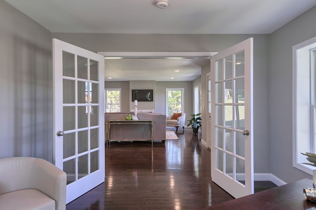 5 Davis Road Chelmsford, MA 01824 - Photo 13 of 27 a living room with furniture and a window