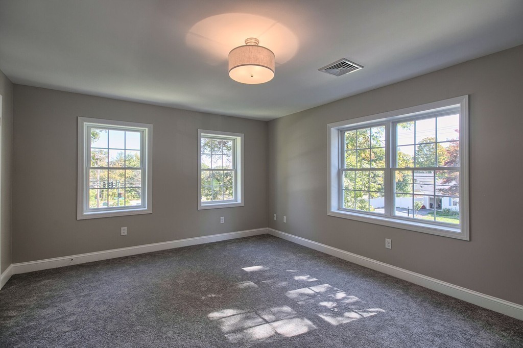 5 Davis Road Chelmsford, MA 01824 - Photo 23 of 27 a view of an empty room with a window