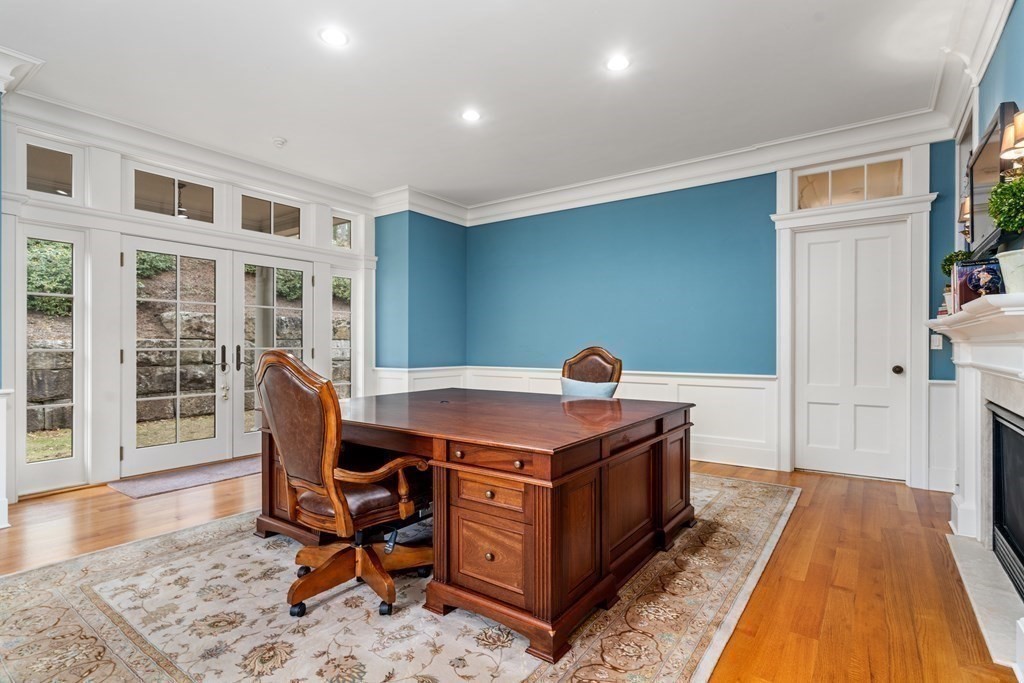 145 Dutton Road Sudbury, MA 01776 - Photo 14 of 41 a view of a room with wooden floor and furniture