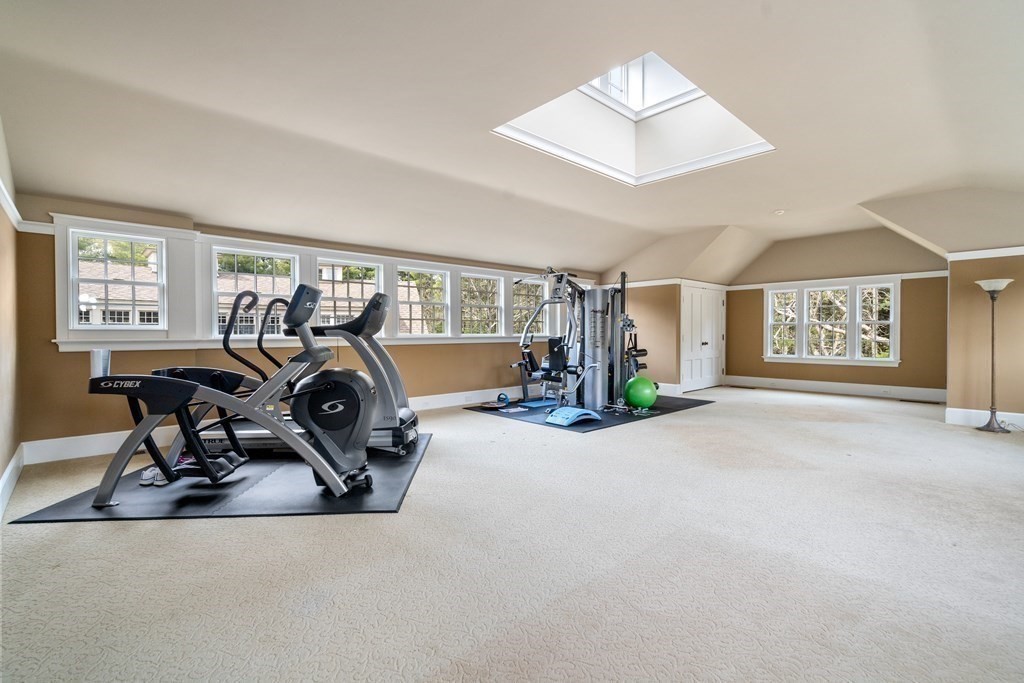 145 Dutton Road Sudbury, MA 01776 - Photo 30 of 41 a view of a room with gym equipment