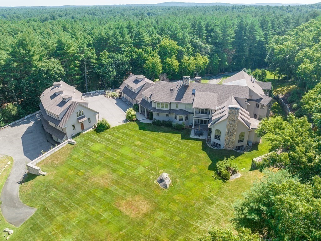 145 Dutton Road Sudbury, MA 01776 - Photo 37 of 41 a aerial view of a house with pool and garden