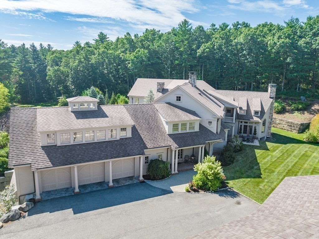 145 Dutton Road Sudbury, MA 01776 - Photo 39 of 41 an aerial view of a house with a yard table and chairs