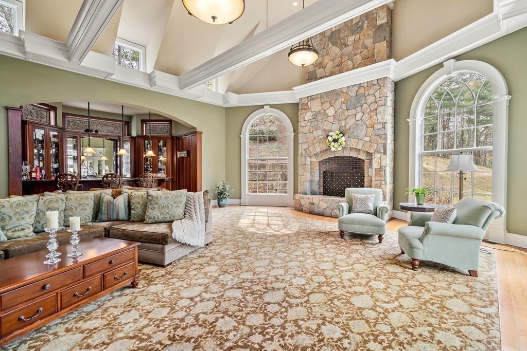 145 Dutton Road Sudbury, MA 01776 - Photo 10 of 41 a living room with furniture and a large window