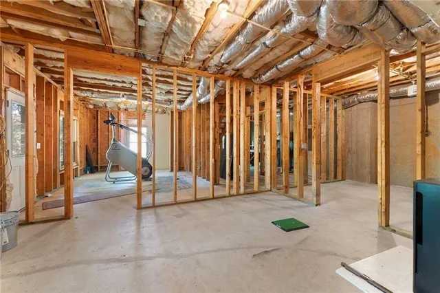 a view of a chairs and table in the patio