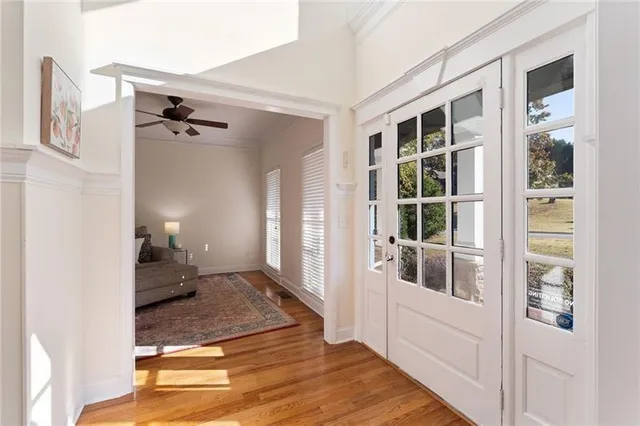 a spacious bedroom with a bed and furniture