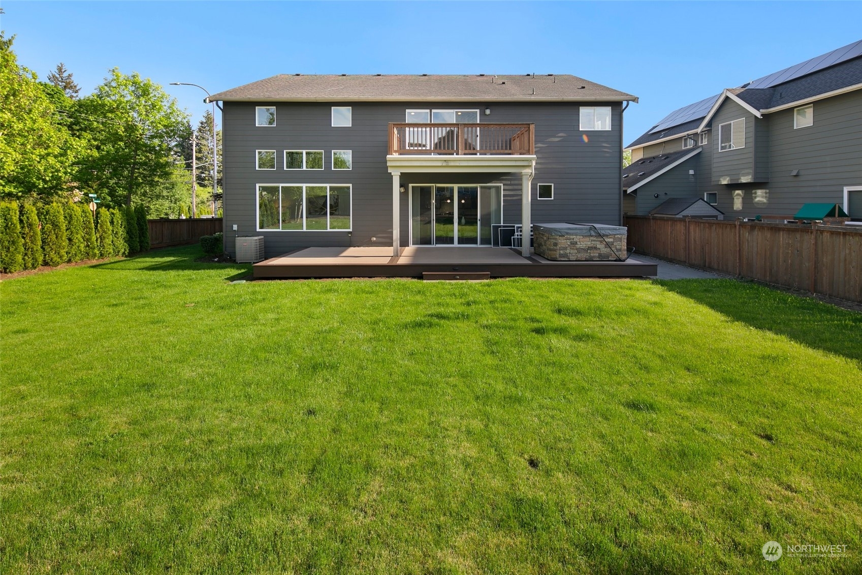 5226 Northeast 2nd Street Renton, WA 98059 - Photo 36 of 40 a view of a house with backyard porch and sitting area