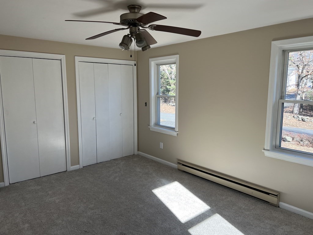 1124 Bemis Road, Unit B Warren, MA 01585 - Photo 30 of 42 a view of an empty room with a window