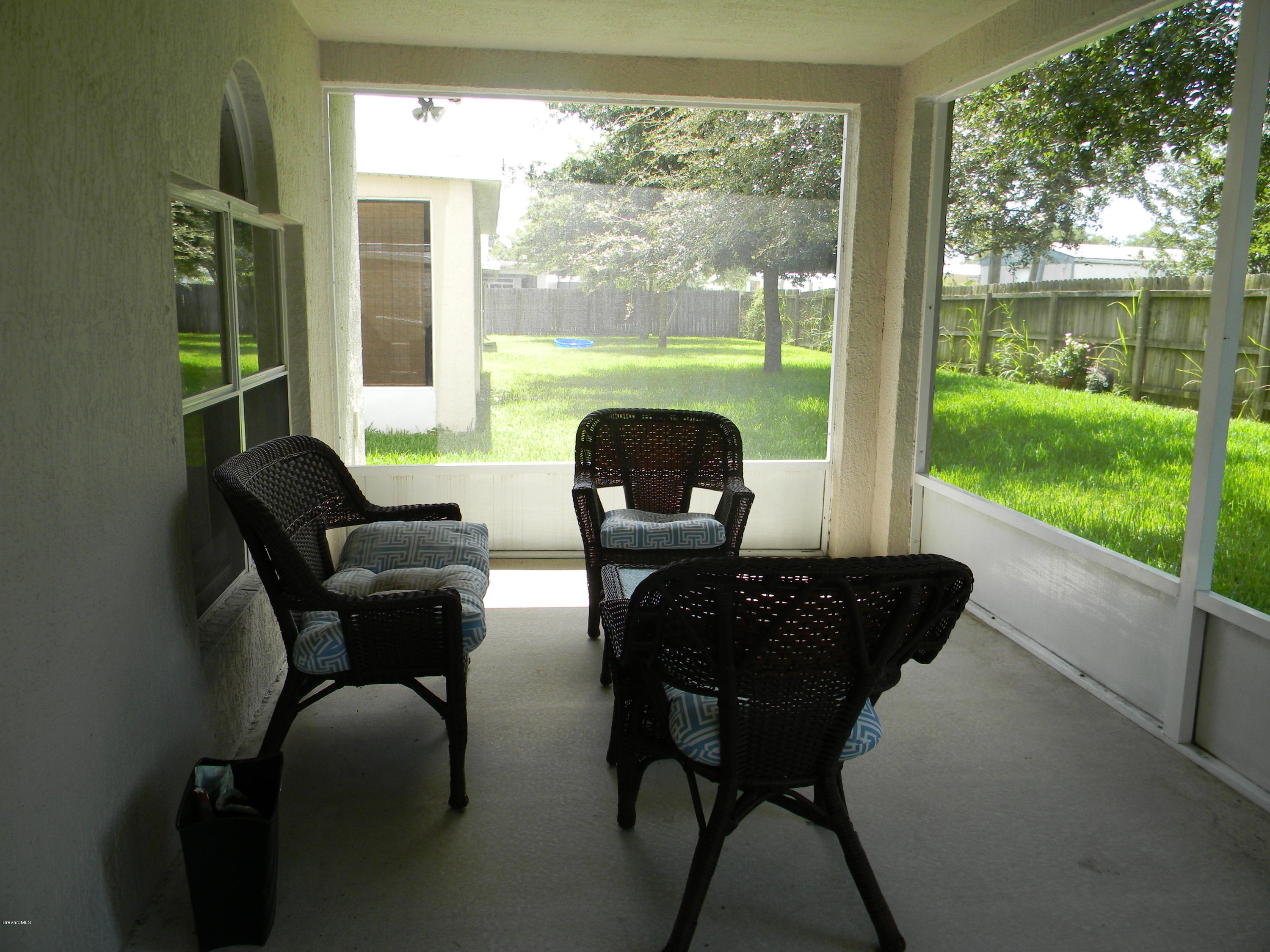 4635 Elena Way Melbourne, FL 32934 - Photo 16 of 19 Screen Porch