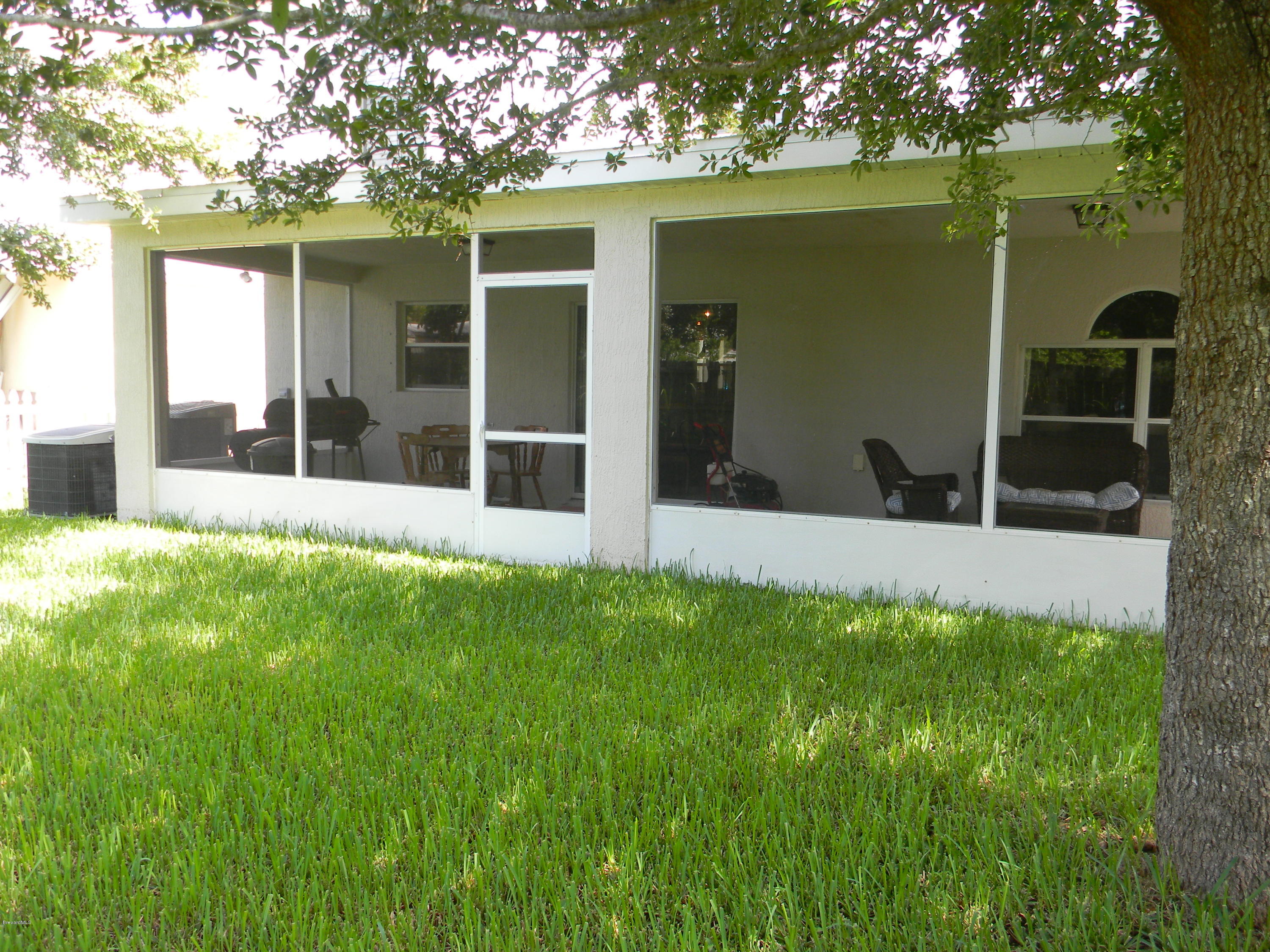 4635 Elena Way Melbourne, FL 32934 - Photo 19 of 19 Screened Porch