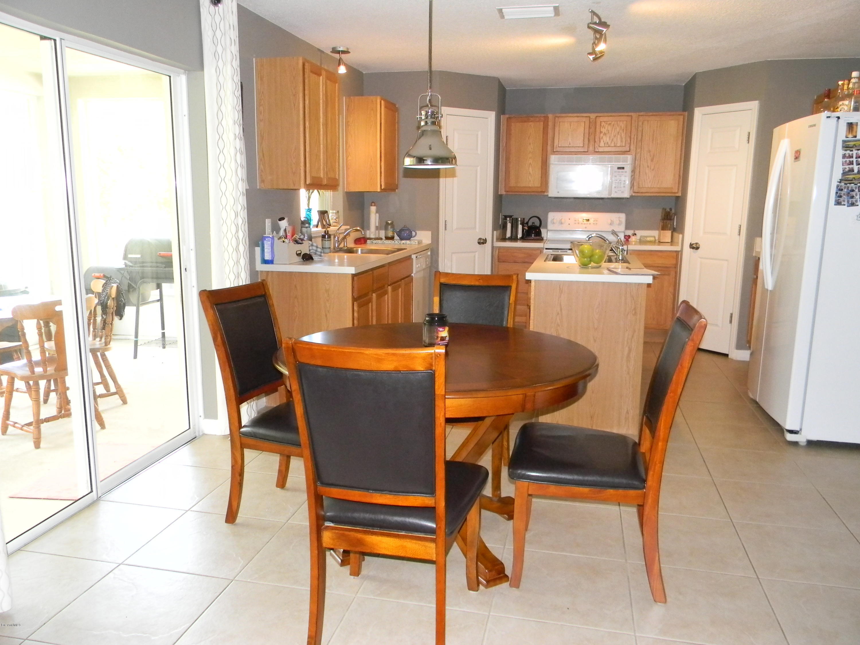 4635 Elena Way Melbourne, FL 32934 - Photo 8 of 19 Eat in Area