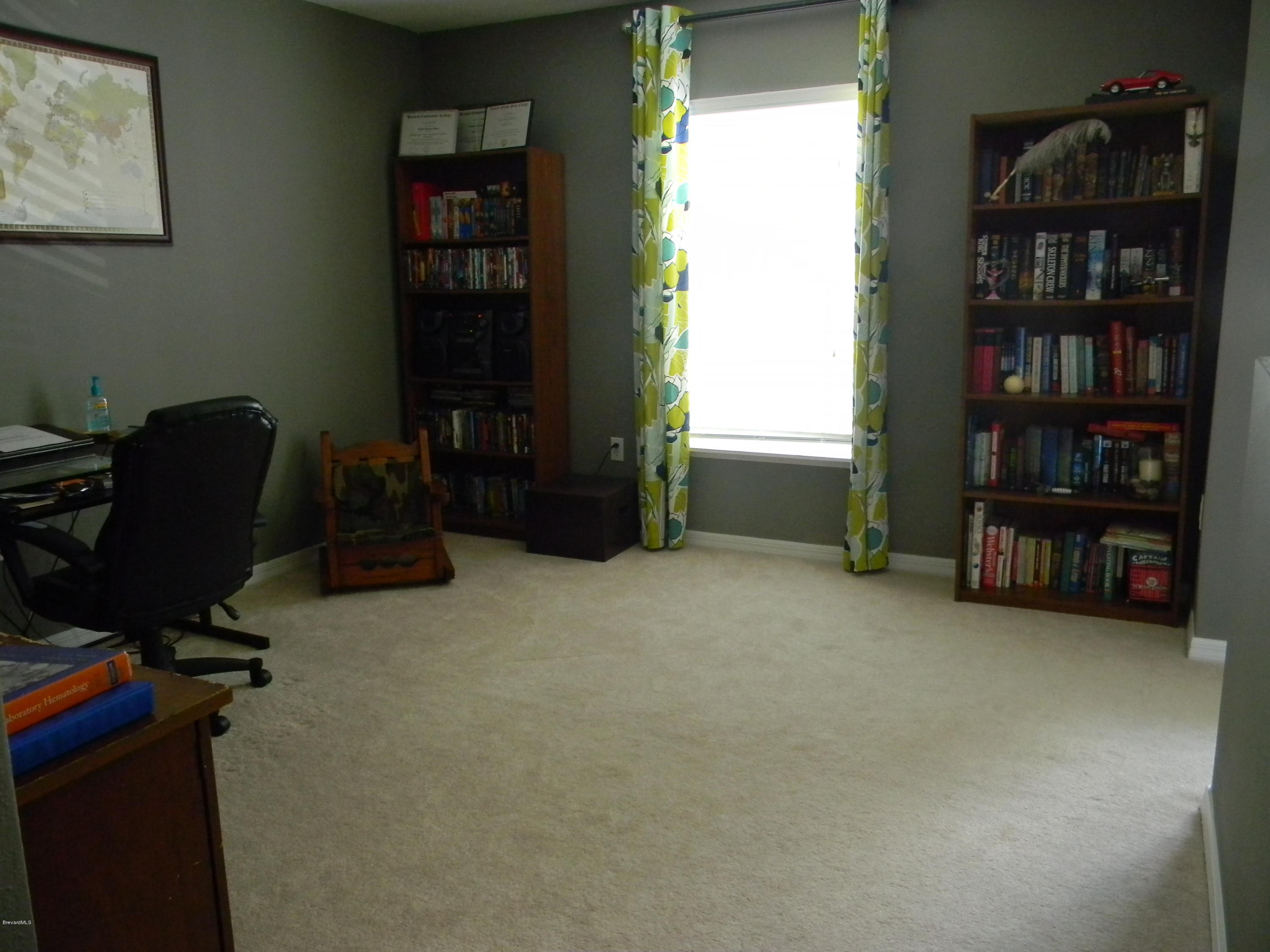 4635 Elena Way Melbourne, FL 32934 - Photo 9 of 19 Loft for Den or Office