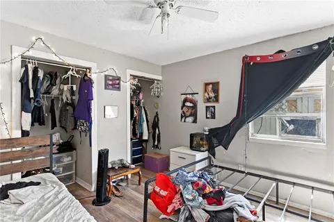 a living room with lots of gym equipment