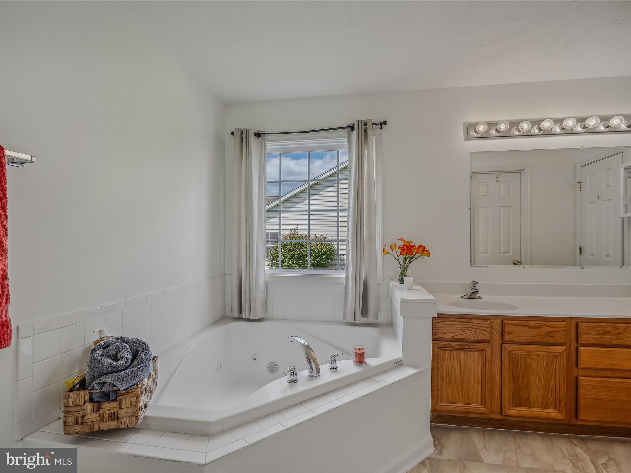 76 Peter Rabbit Drive Ranson, WV 25438 - Photo 18 of 37 vanity, large soaking tub w/ window
