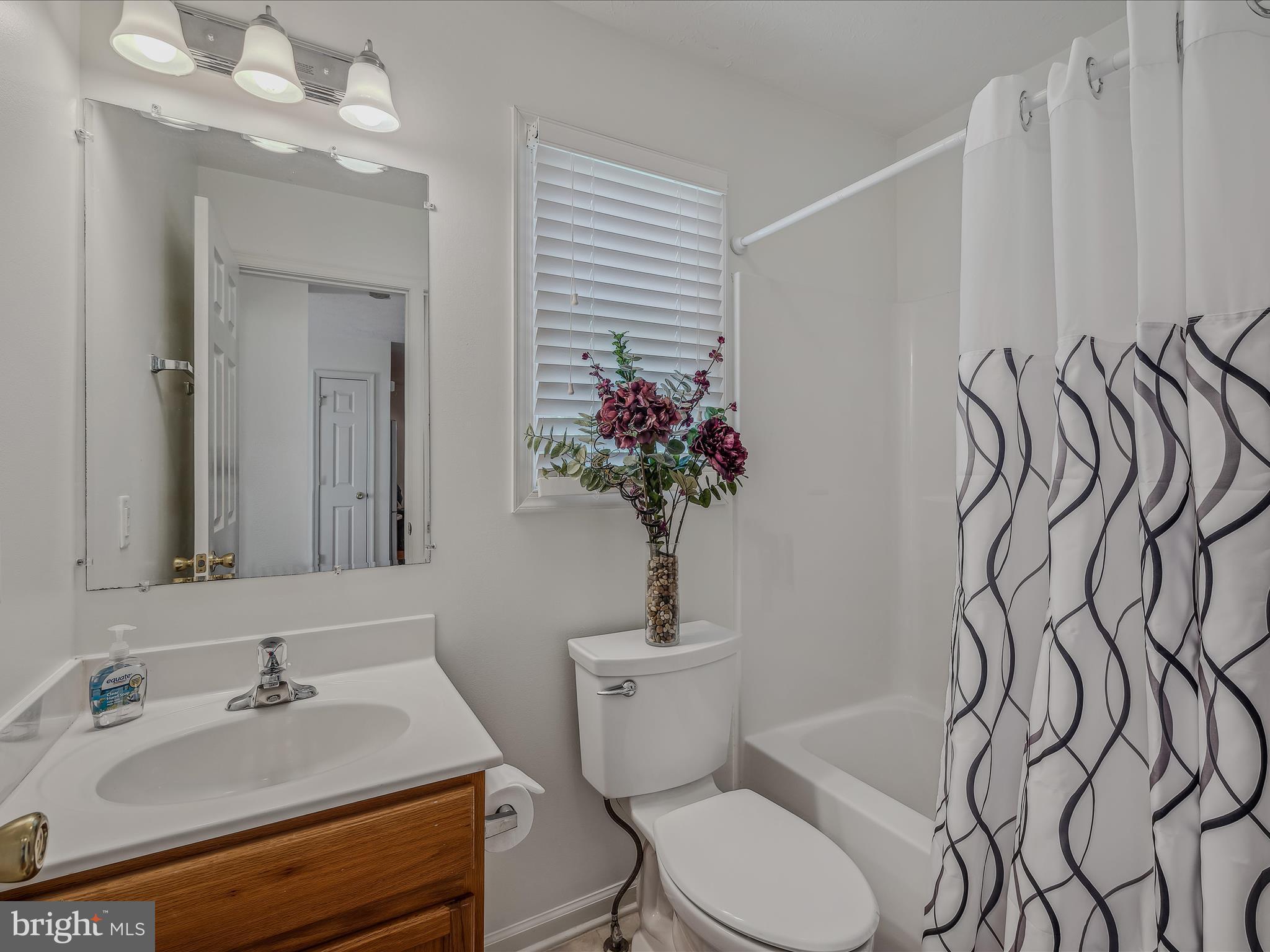 76 Peter Rabbit Drive Ranson, WV 25438 - Photo 23 of 37 Hall bath w/ single bowl vanity + tub/shower
