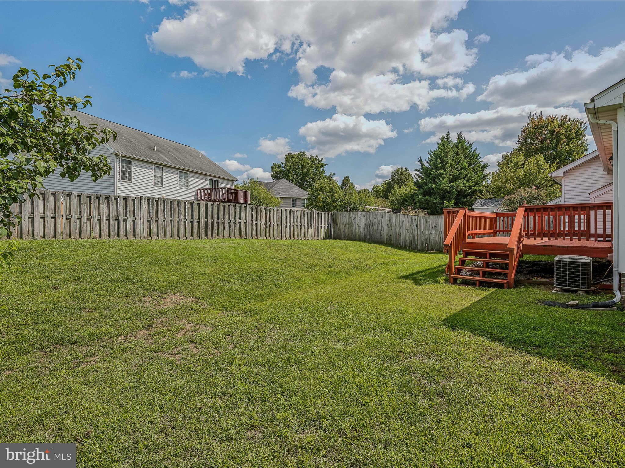 76 Peter Rabbit Drive Ranson, WV 25438 - Photo 26 of 37 beautiful rear yard. Large, level, lot is lush