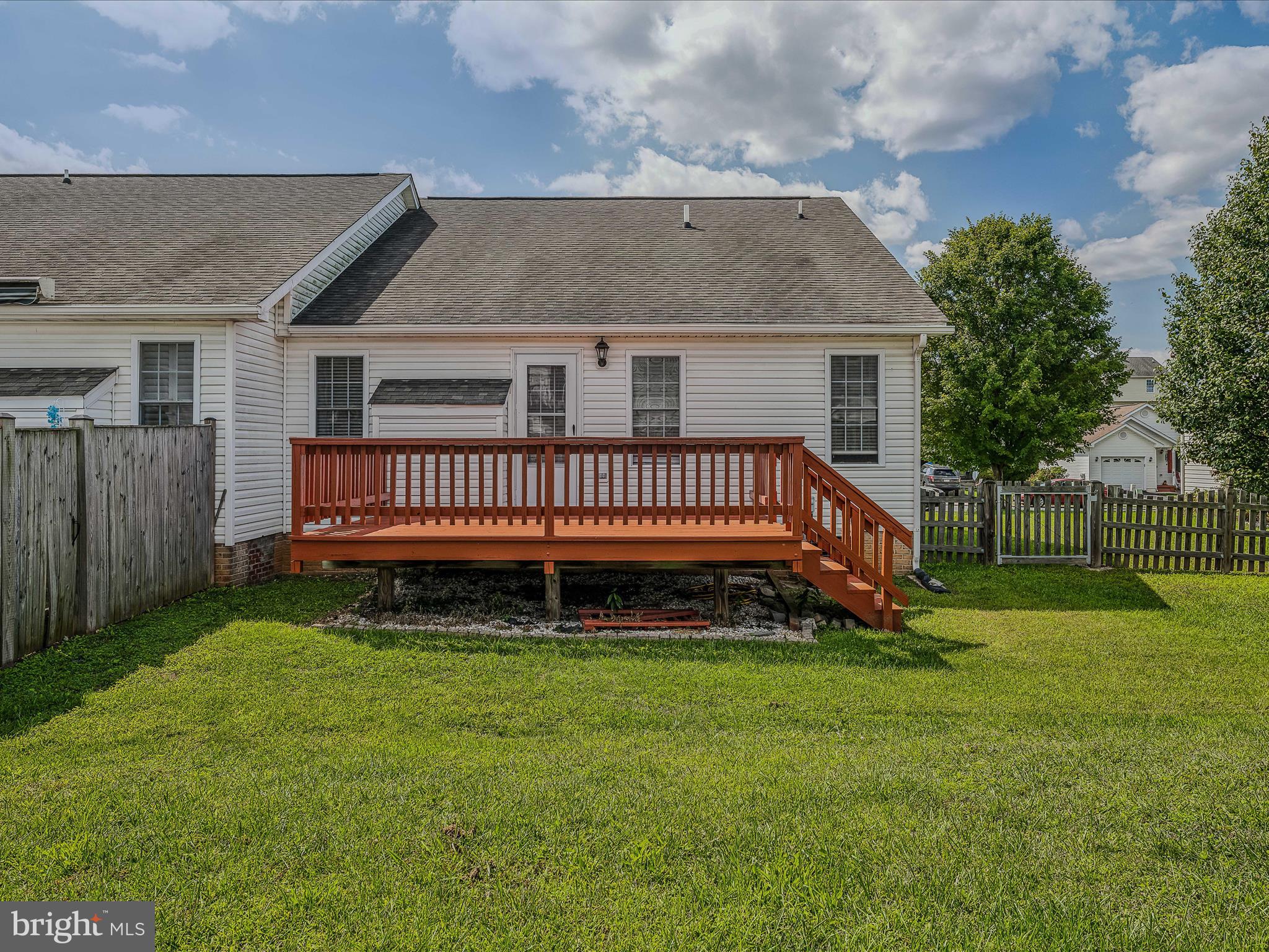76 Peter Rabbit Drive Ranson, WV 25438 - Photo 27 of 37 with grass, mature trees provide dimension