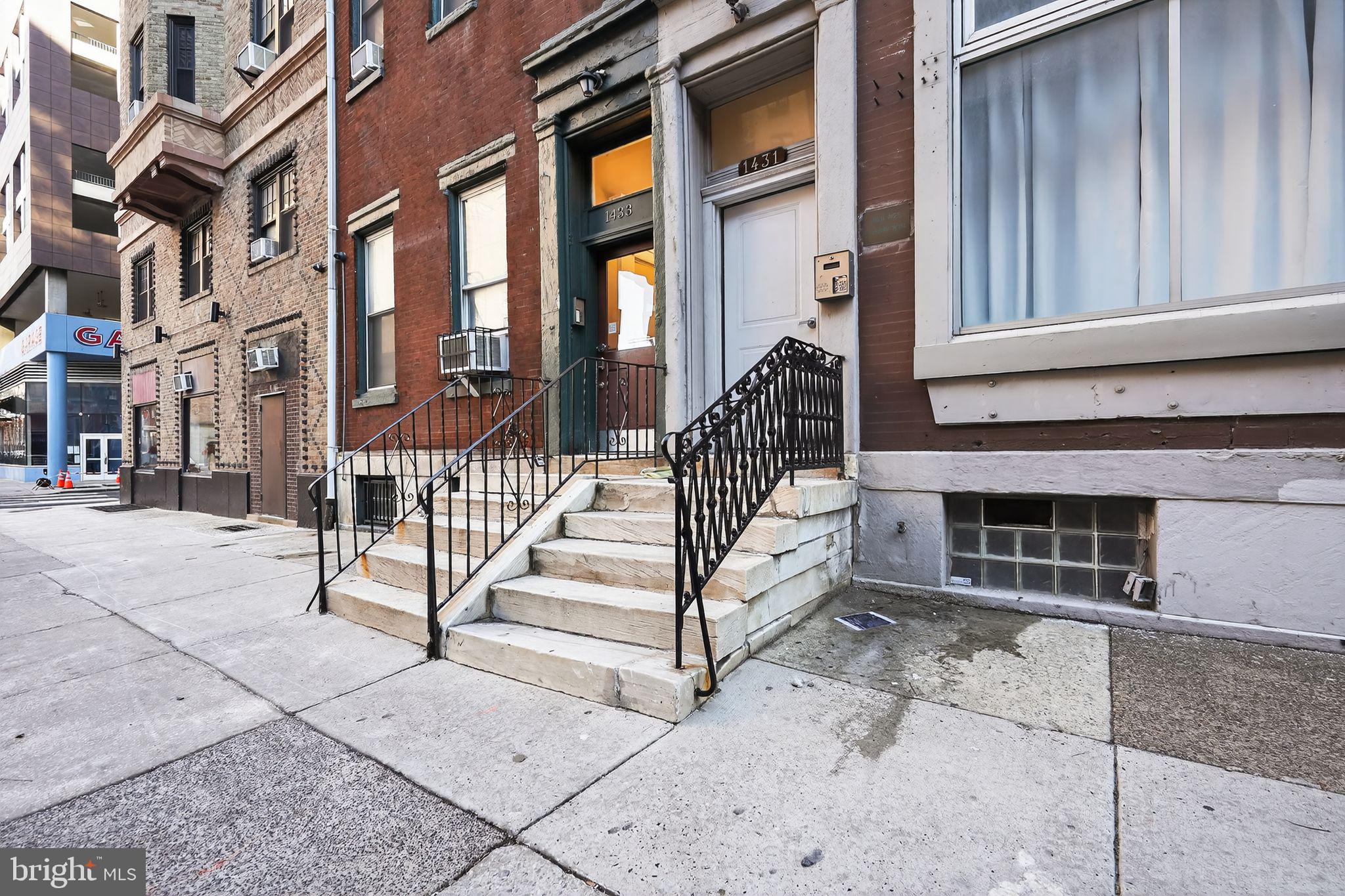 1431 Spruce Street, Unit 1R Philadelphia, PA 19102 - Photo 19 of 20 a view of a building with a stairs
