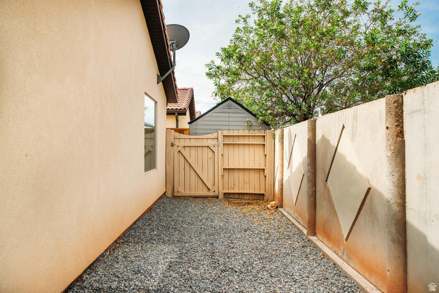 1330 North Dixie Downs Road, Unit 72 St. George, UT 84770 - Photo 3 of 21 View of yard featuring a gate