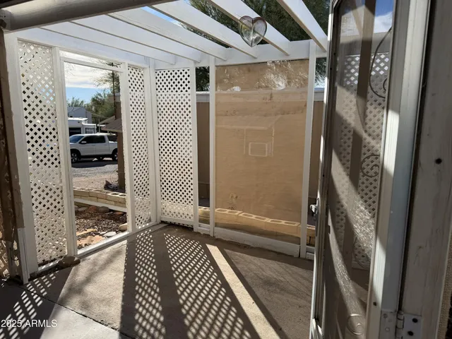 a bathroom with a mirror and a shower