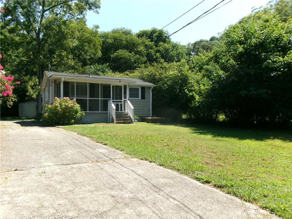 a view of a backyard of the house