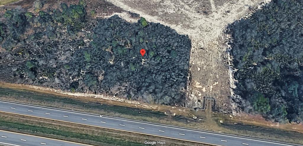 27 Hwy Frostproof Frostproof, FL 33843 - Photo 2 of 5 a view of a house with a tree