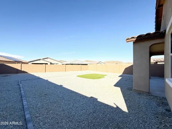 a view of a swimming pool with an outdoor seating