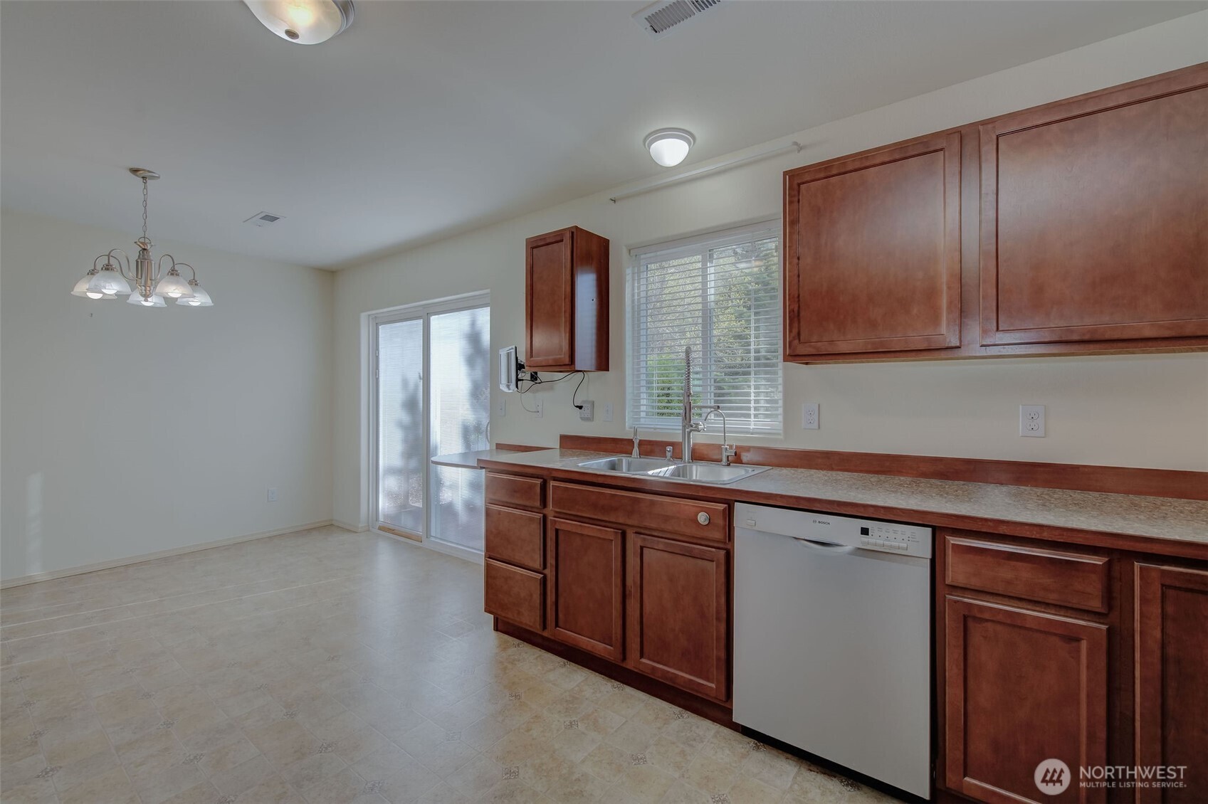224 Vine Street Cashmere, WA 98815 - Photo 16 of 35 a kitchen with sink and cabinets